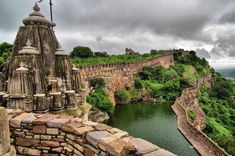 a kund or pond at the chittorgarh fort on a cloudy day
