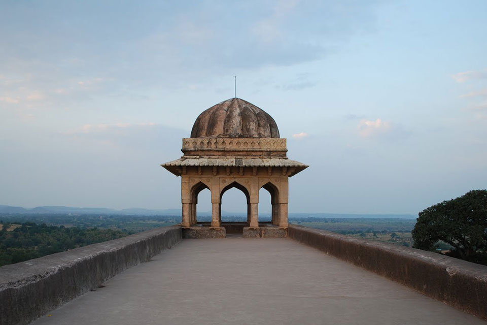 one of the rear porches of roopmati pavilion that open to the great view of mandav outskirts during the sunset