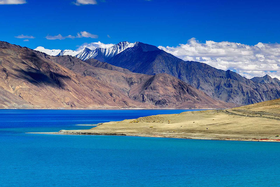 wide view of pangong lake in the valleys of ladakh